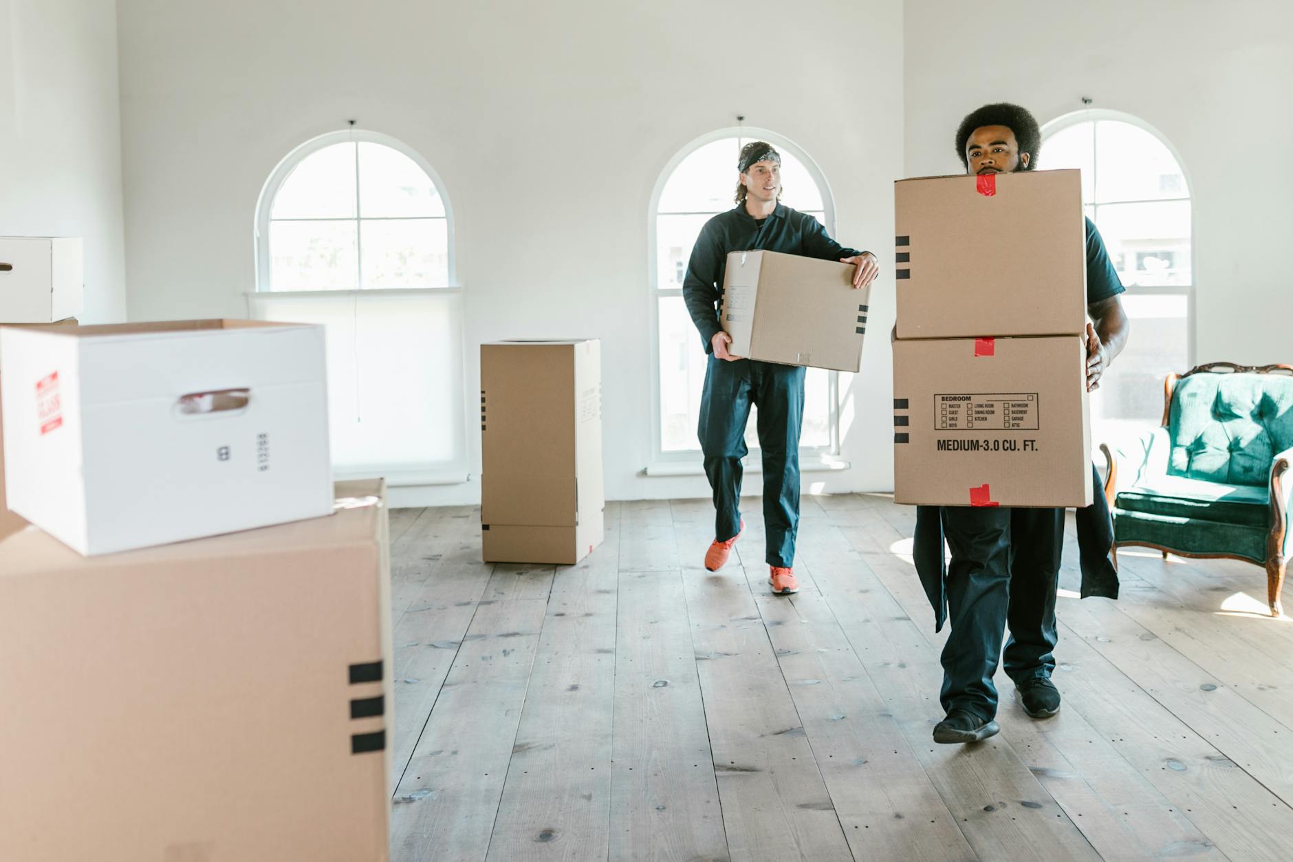 Professional movers loading a truck